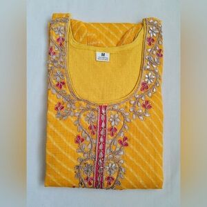 Leheriya Yellow  kurta with gota work on the yoke